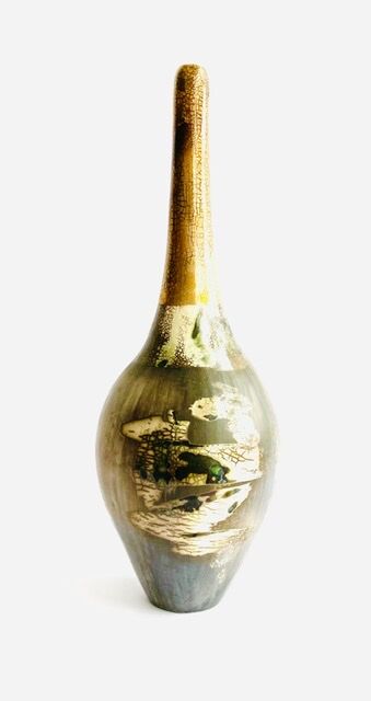 Burnished smoke-fired ceramic pot with gold lustre.