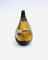 Small gold lustre, smoke-fired porcelain pot.