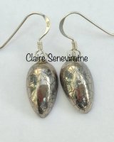 Small silver teardrop earrings with a crackle glaze.