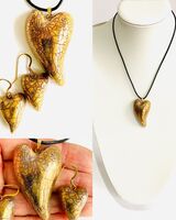 Gold heart pendant set.