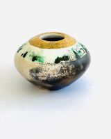 Smoke fired pot with gold.