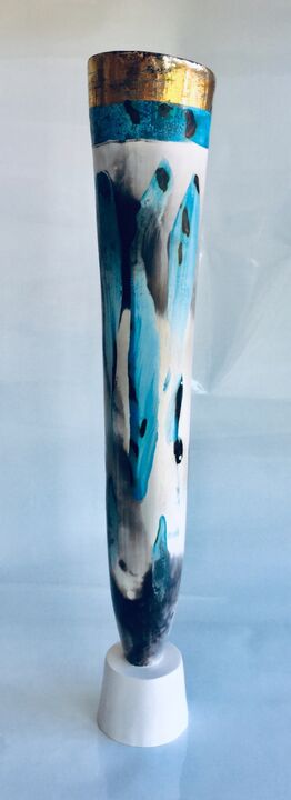 Tall blue smoke-fired vessel on a stand.