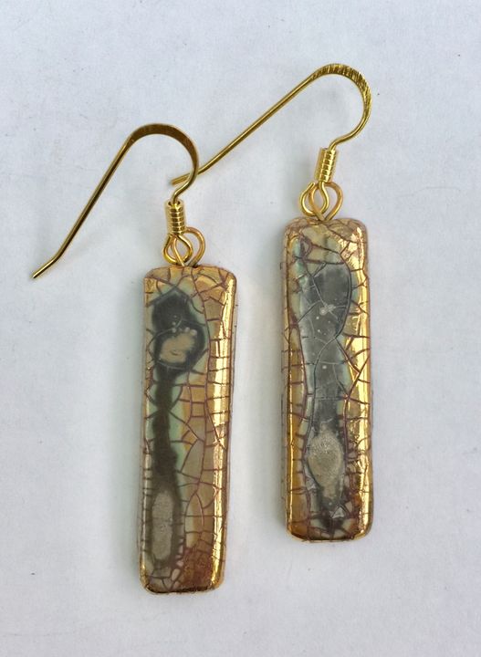 Gold rectangular ceramic earrings with crackled glaze.