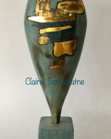 Sculptural blue porcelain pot.