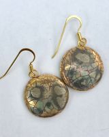Round ceramic earrings with glaze and gold lustre.