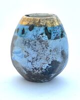 Small blue smoke-fired pot with gold lustre.