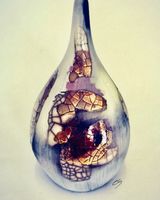 Smoke-fired porcelain pot with gold lustre.