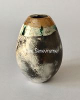 Upright smoke fired pot with gold.