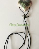 Heart pendant with black green and pink.