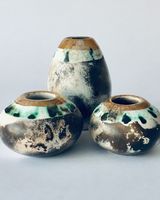 Collection of small pots.