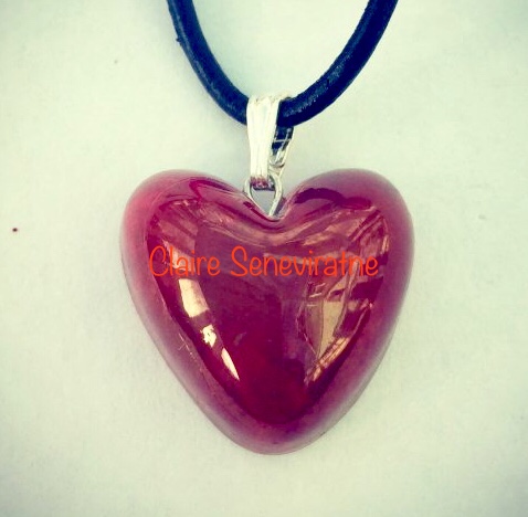 Small red heart pendant.