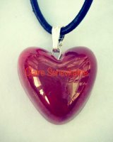 Small red heart pendant.