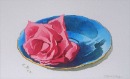 Compassion Rose In A Blue saucer