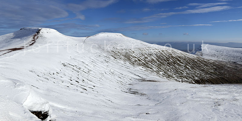 3 snow covered peaks