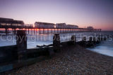 Sun rising behind the pier, Southwold