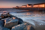 First rays catch the pier, Southwold