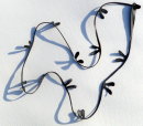 Necklace hand cut to a 'Seaweed' theme