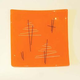 orange, black and white square dish