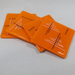 orange black and white coasters