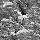 abstract black and white photographic art of rock structures on the island of Sifnos, Greece