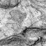 abstract black and white photographic art of rock structures on the island of Sifnos, Greece