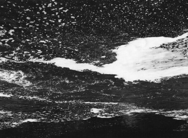 black and white abstract artistic photographs of foam shapes in the Conestoga River at the dam in St. Jacob's, Ontario