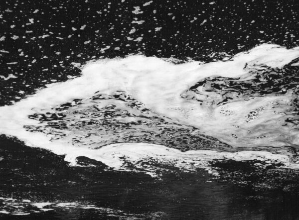 black and white abstract artistic photographs of foam shapes in the Conestoga River at the dam in St. Jacob's, Ontario