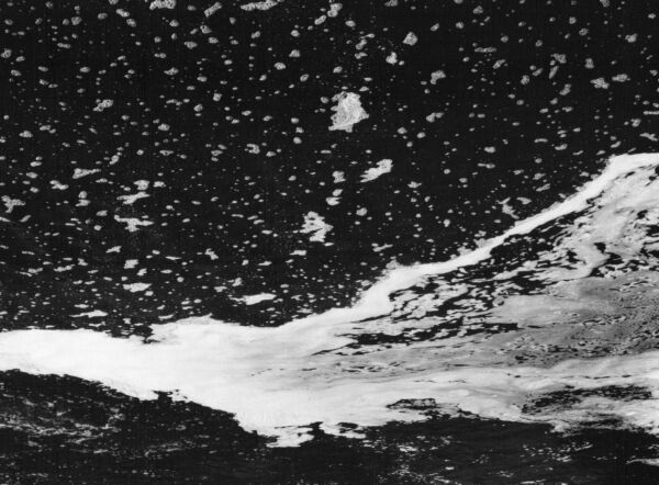 black and white abstract artistic photographs of foam shapes in the Conestoga River at the dam in St. Jacob's, Ontario