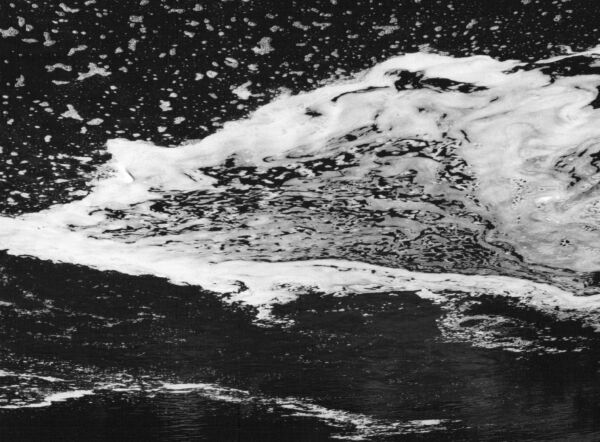 black and white abstract artistic photographs of foam shapes in the Conestoga River at the dam in St. Jacob's, Ontario