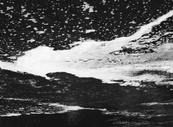 black and white abstract artistic photographs of foam shapes in the Conestoga River at the dam in St. Jacob's, Ontario