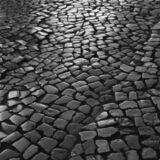 black and white photographic art of cobblestones in Lagos, Portugal