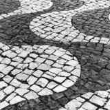 black and white photographic art of cobblestones in Lagos, Portugal