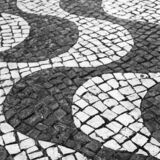 black and white photographic art of cobblestones in Lagos, Portugal