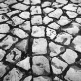 black and white photographic art of cobblestones in Lagos, Portugal