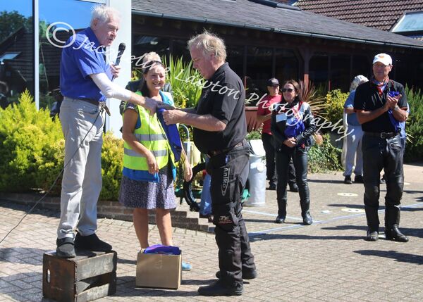 Sammy Miller presents prizes