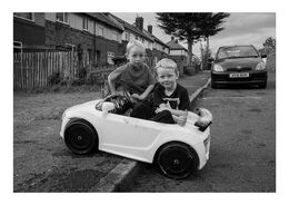 Boys in Toy Car A4 print