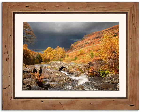 Ashness Bridge in Autumn 1, including distressed knotty wood frame & mount