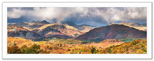 A storm cloud bursts over Bowfell