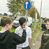 Three Boys smoking at Ballinasloe Fair, Galway, Ireland 2018