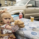 Ann eating chips at Ballinasloe Fair, Galway, Ireland 2018