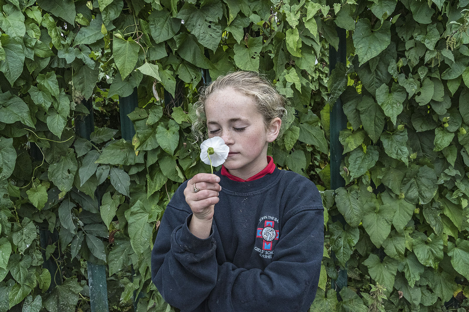 Kaitlyn smelling Flower, Tipperary, Ireland 2019