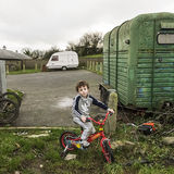 Luke on his bike, halting site, Tipperary, Ireland 2018