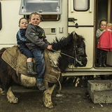 Michael and Pa on pony and Nikita with doll, roadside campsite, Tipperary, Ireland 2019
