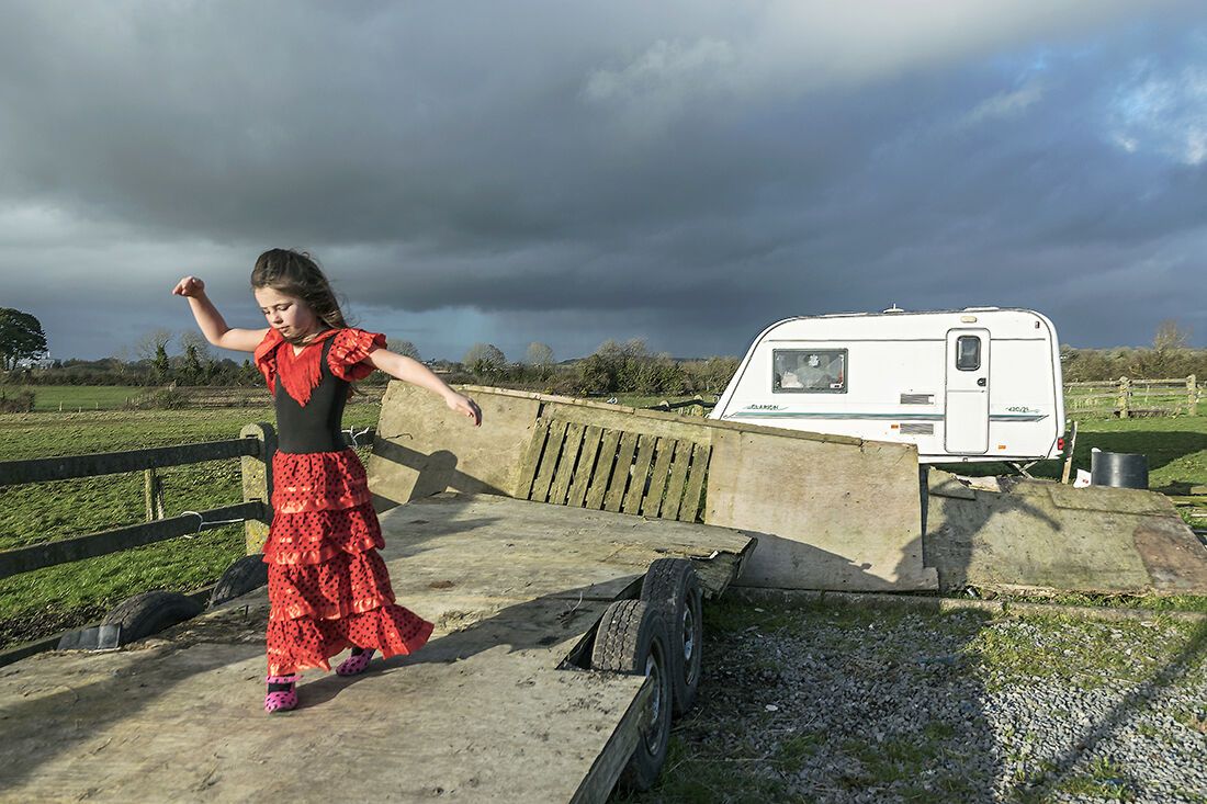 Nikita trying her new flamenco dress, roadside campsite, Tipperary, Ireland 2019
