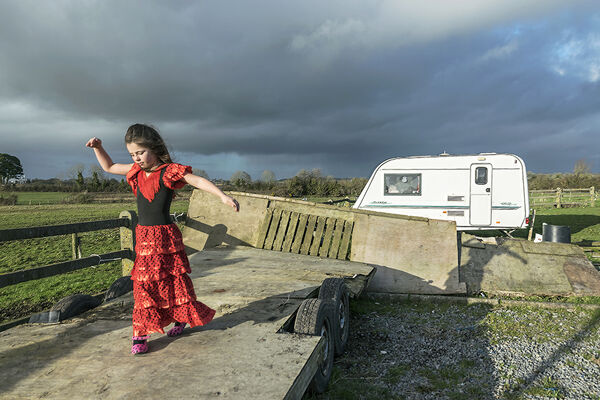 Nikita trying her new flamenco dress, roadside campsite, Tipperary, Ireland 2019