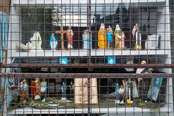 Religious Statues in Shop Window, Galway, Ireland 2022