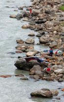 Washing clothes in the river