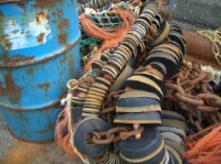 blue bin and fishing floats, Cornwall