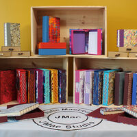 Sketchbooks Journals  boxeson display Julie Macbean Artist