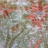Reverse applique with dyed materials